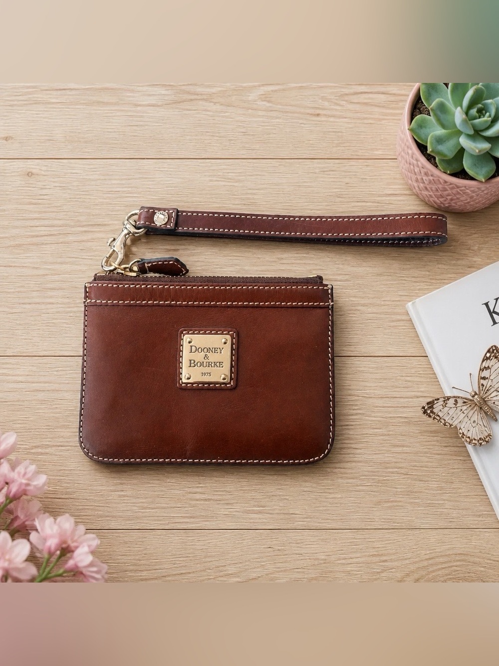 Dooney & Bourke Brown Leather Wristlet Pouch with Gold Plaque